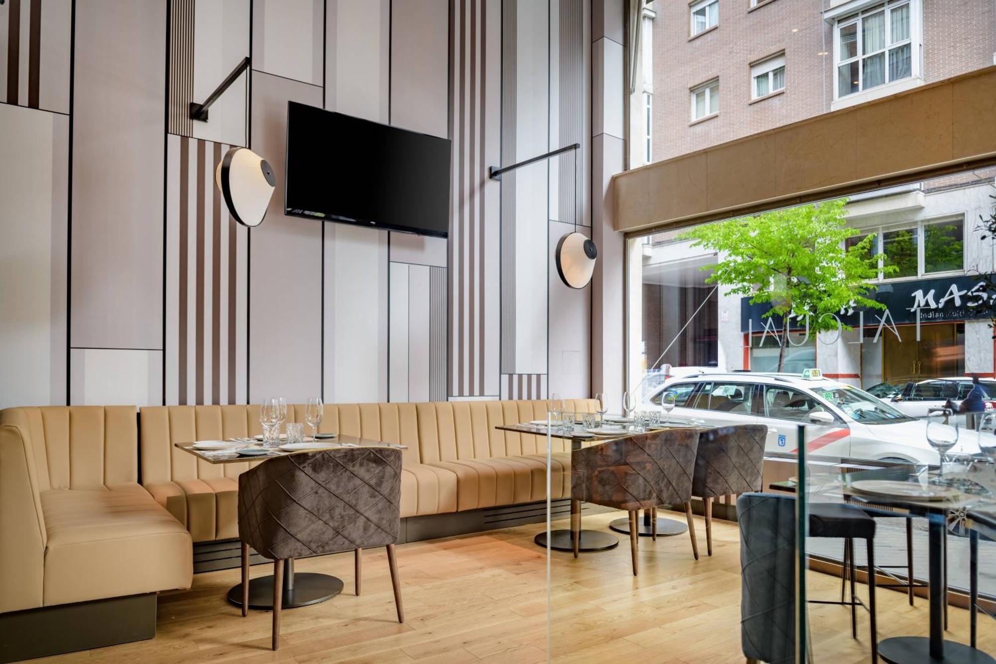 Ac Hotel Avenida De America By Marriott Madrid Bagian luar foto